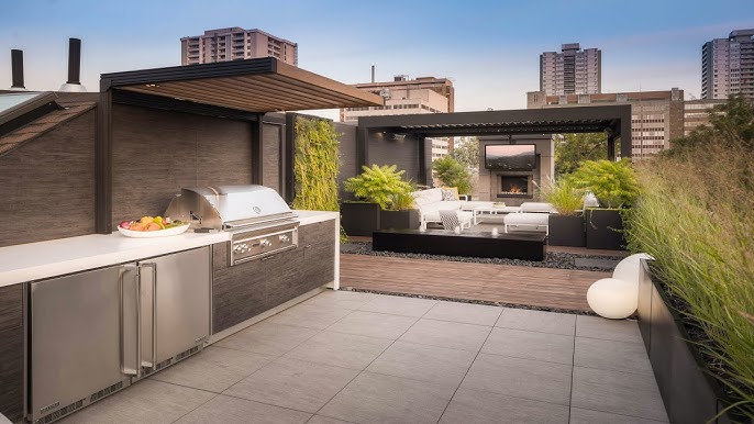 Urban rooftop terrace with outdoor kitchen